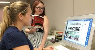 Lamar University Press students working on paper